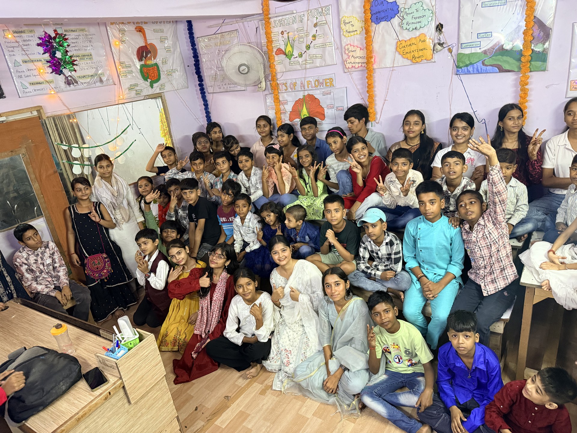 SCC Classes students and teachers celebrating together at the Tughlakabad Extension centre