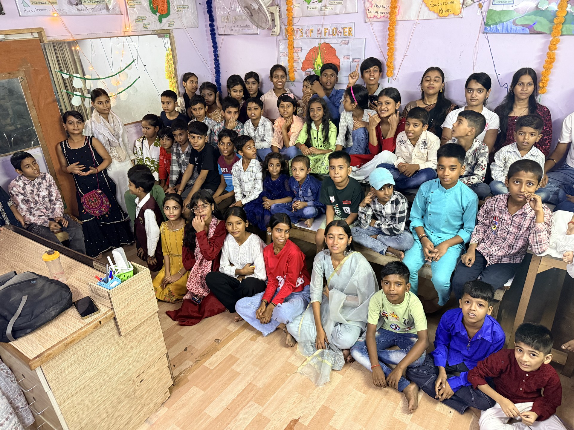 SCC Classes students and teachers celebrating together at the Tughlakabad Extension centre