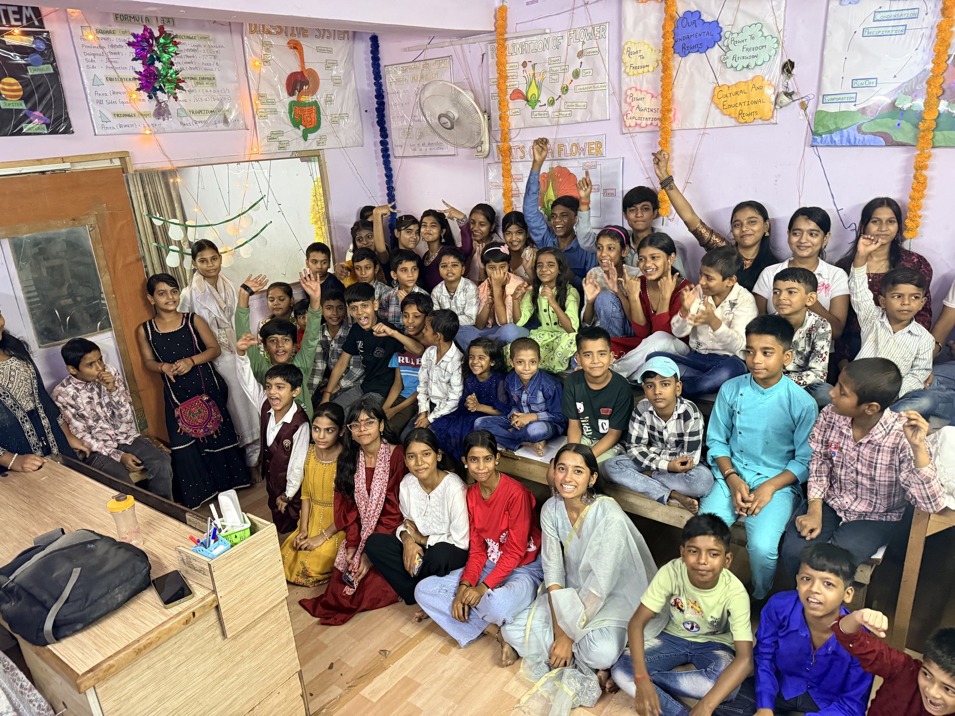 SCC Classes students and teachers celebrating together at the Tughlakabad Extension centre
