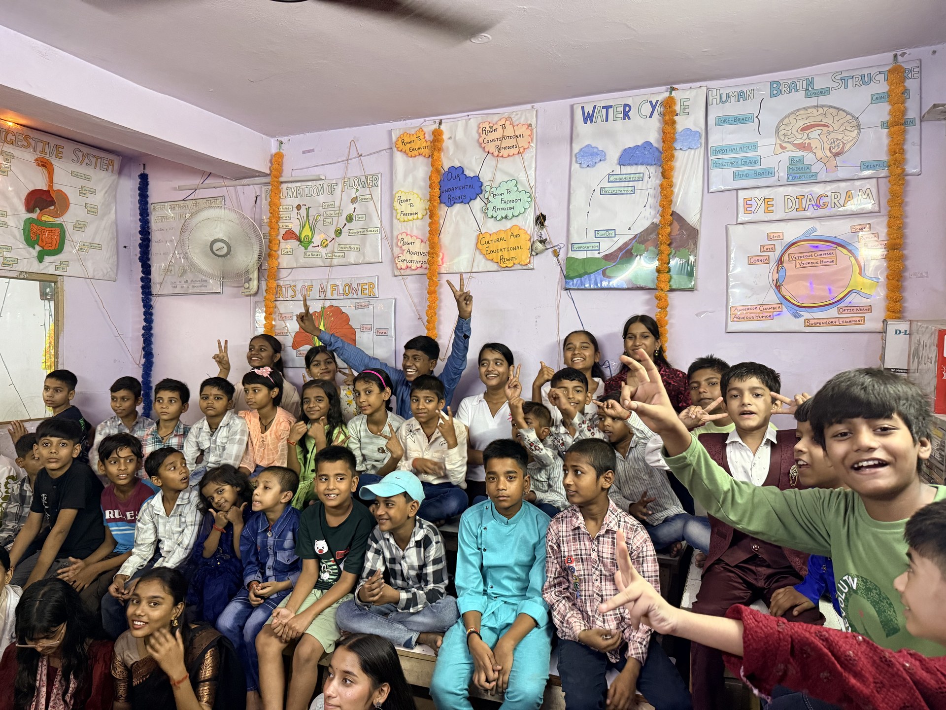 SCC Classes students and teachers celebrating together at the Tughlakabad Extension centre