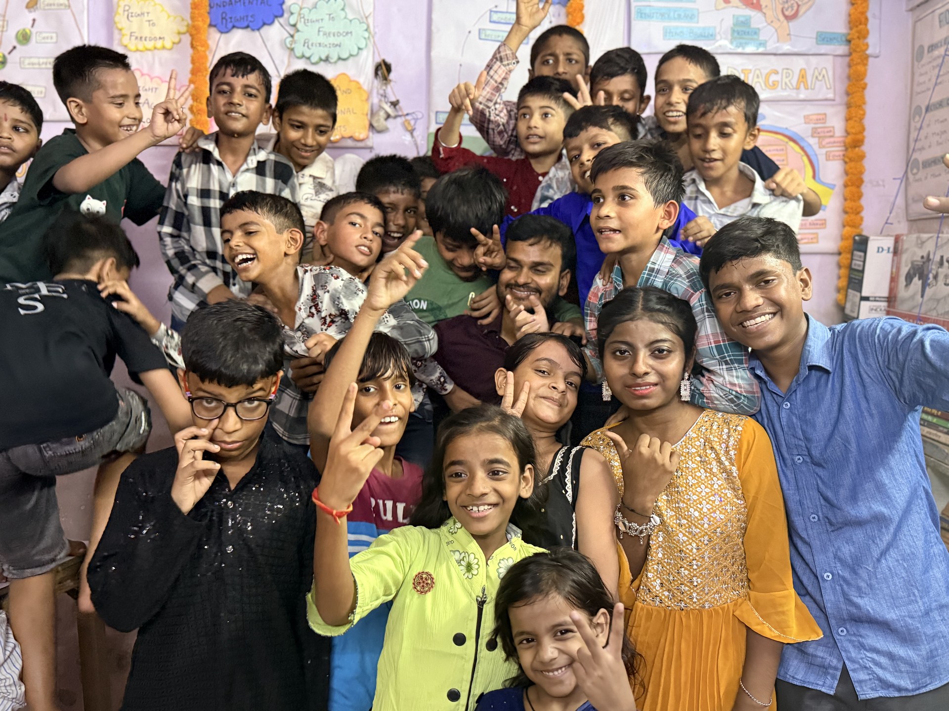 SCC Classes students and teachers celebrating together at the Tughlakabad Extension centre