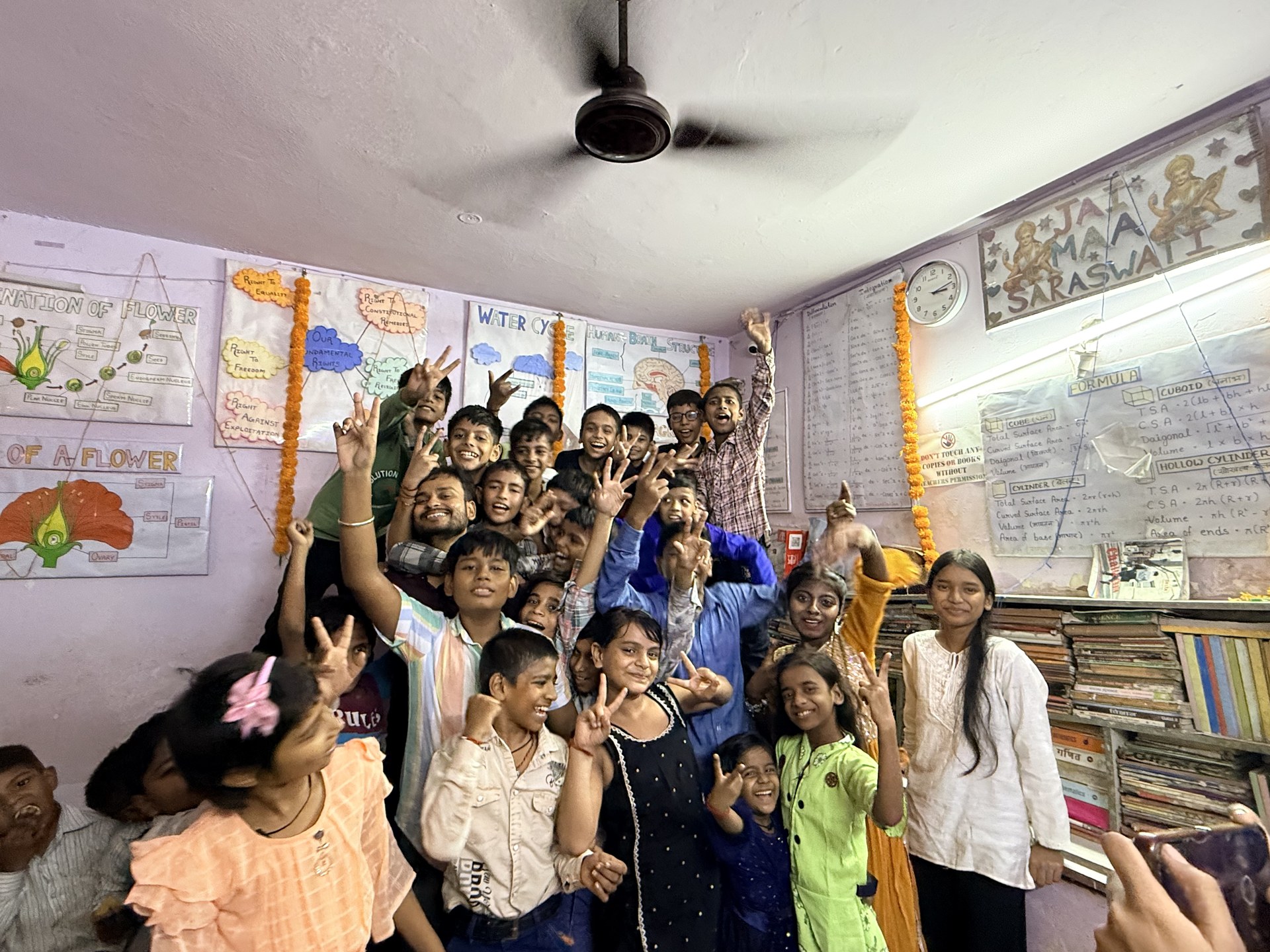 SCC Classes students and teachers celebrating together at the Tughlakabad Extension centre