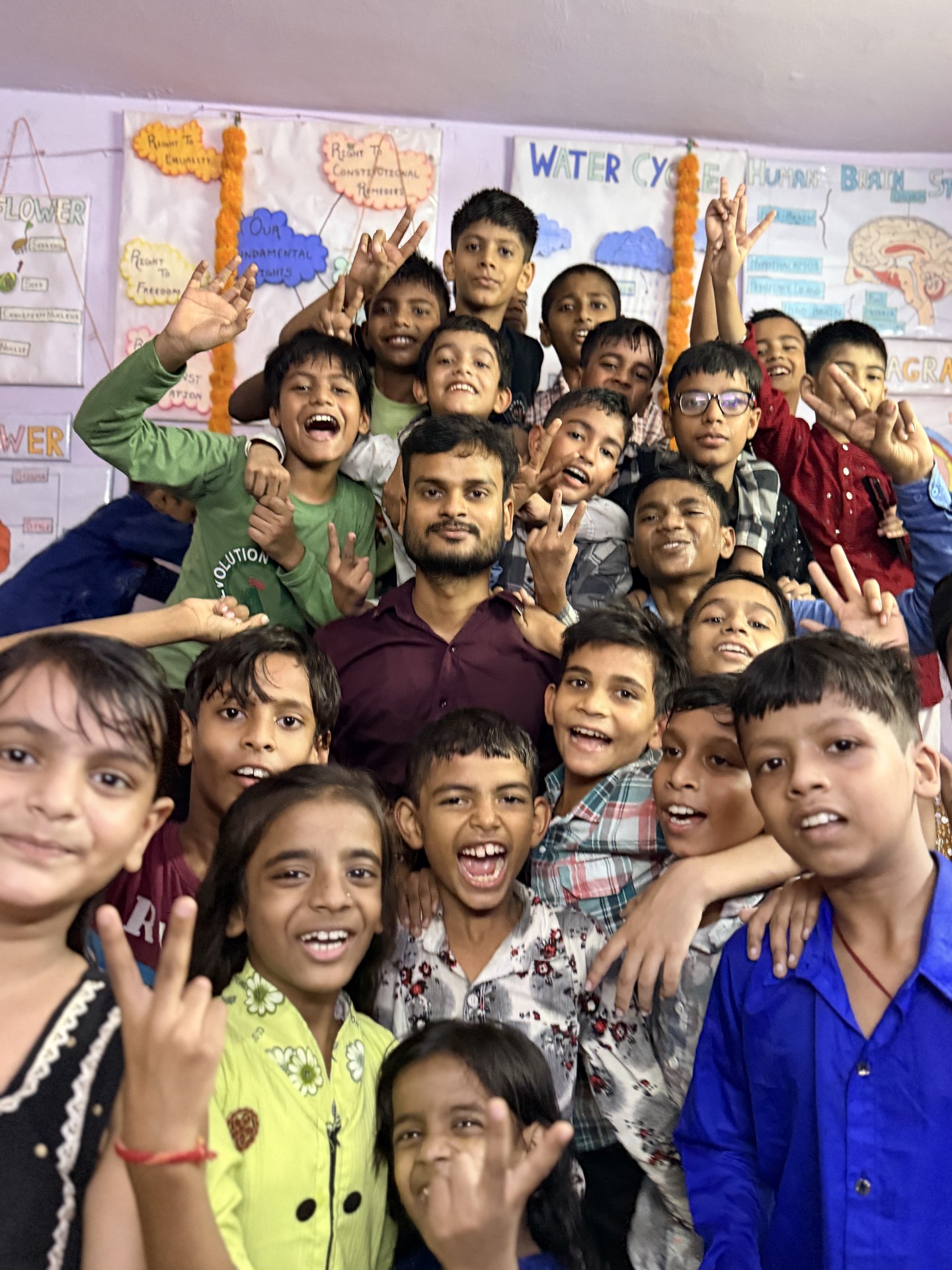 SCC Classes students and teachers celebrating together at the Tughlakabad Extension centre