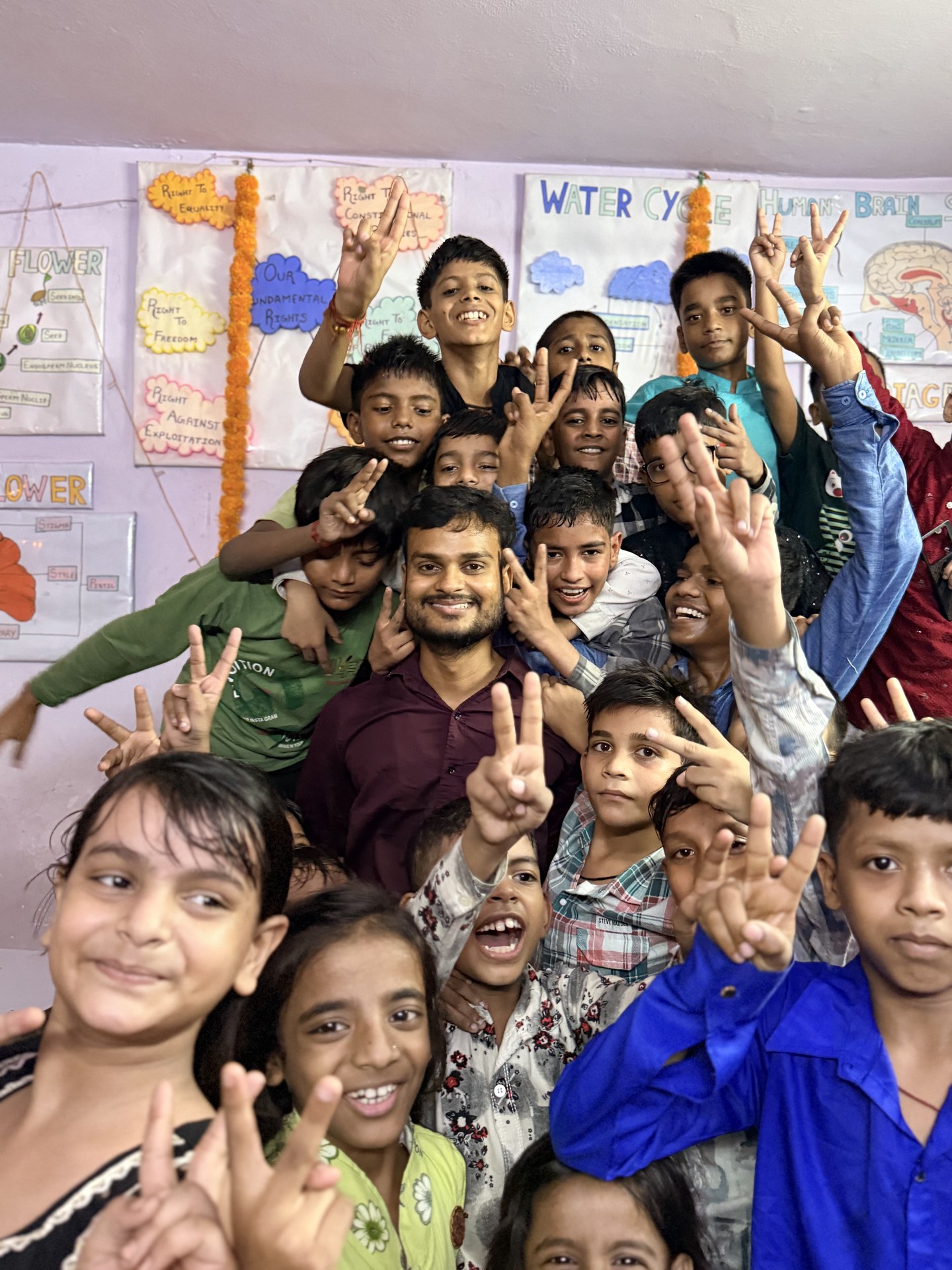 SCC Classes students and teachers celebrating together at the Tughlakabad Extension centre