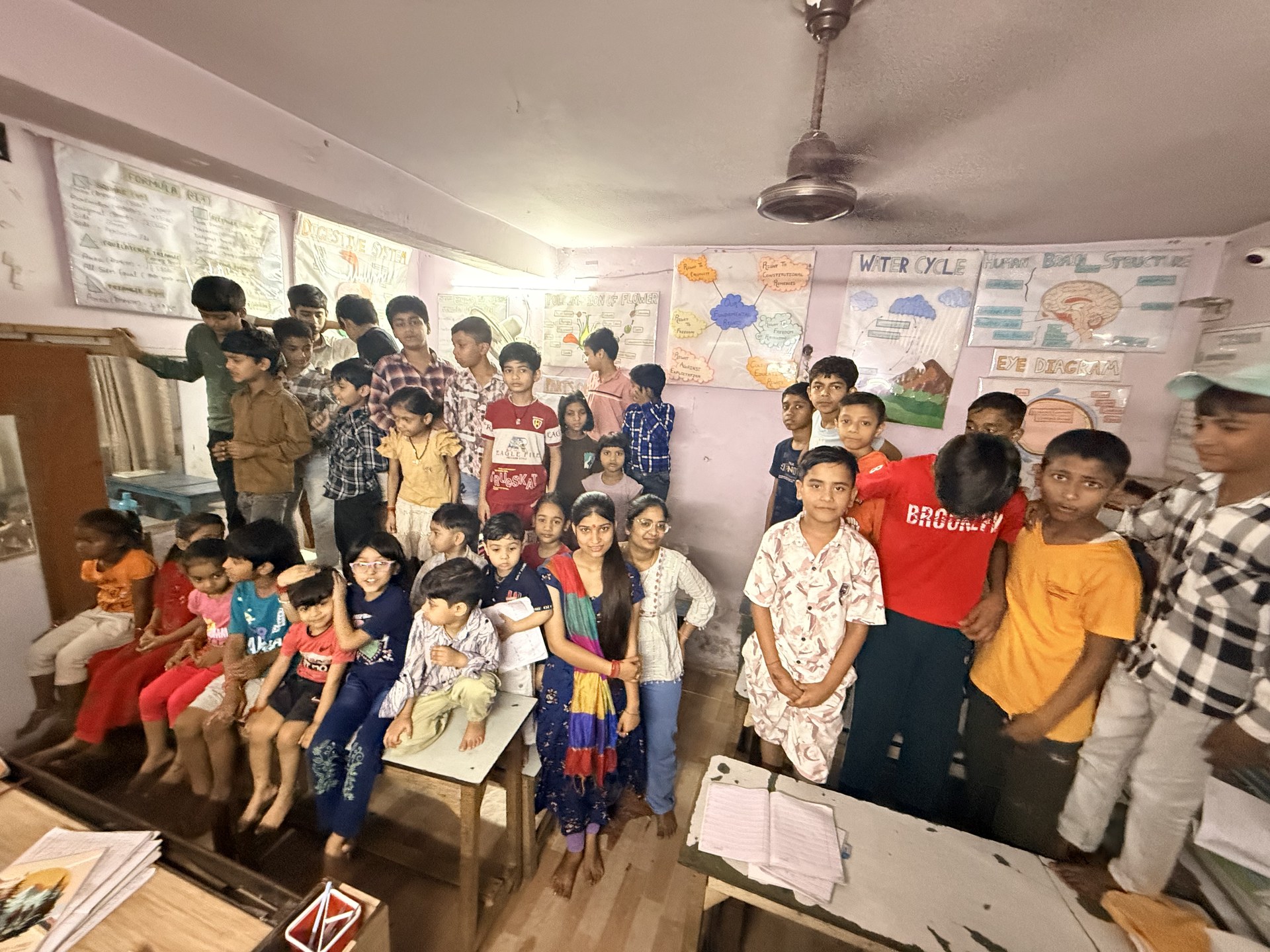 SCC Classes students and teachers celebrating together at the Tughlakabad Extension centre