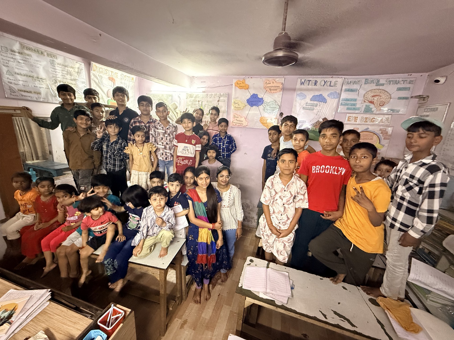 SCC Classes students and teachers celebrating together at the Tughlakabad Extension centre