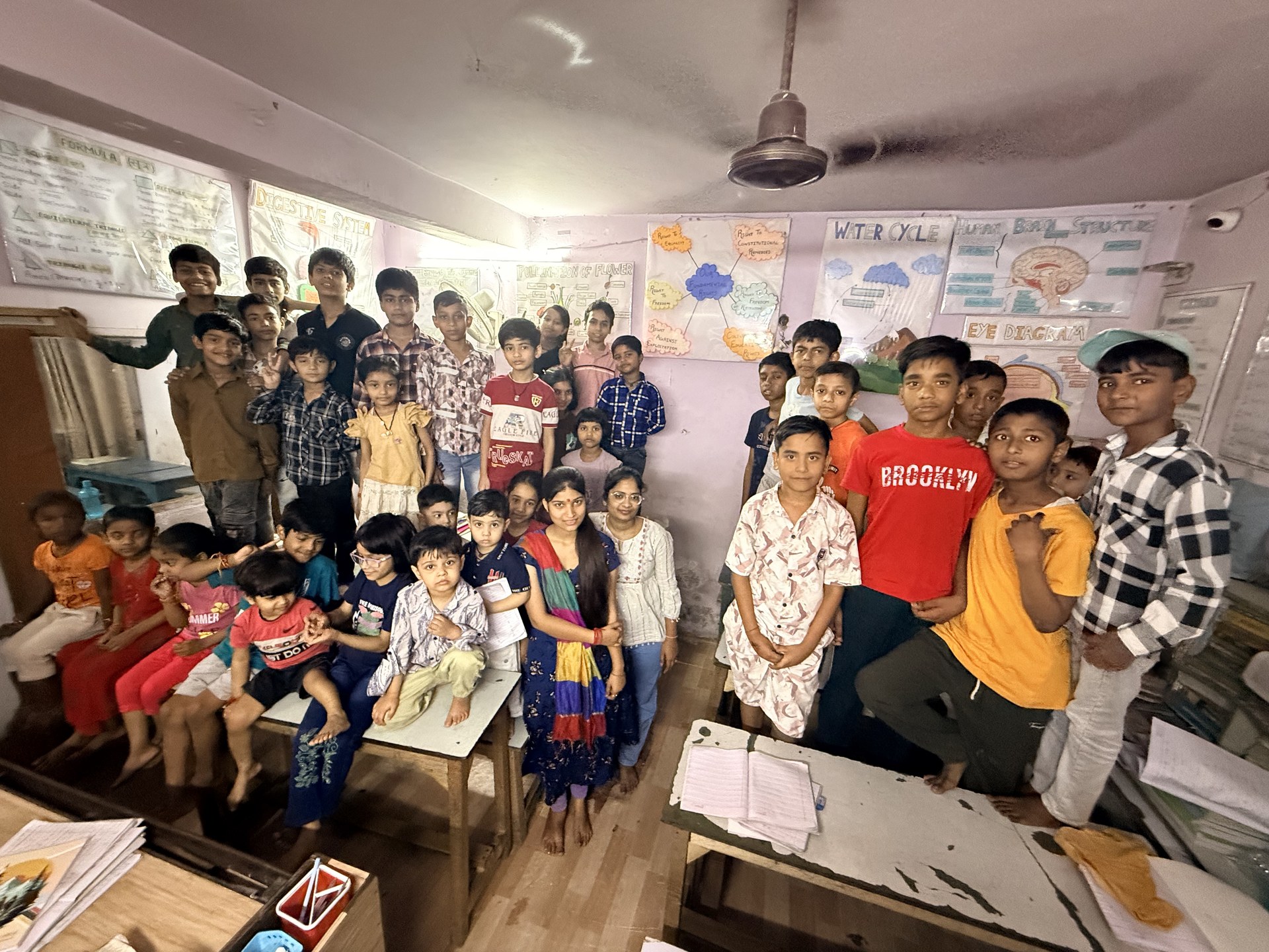 SCC Classes students and teachers celebrating together at the Tughlakabad Extension centre